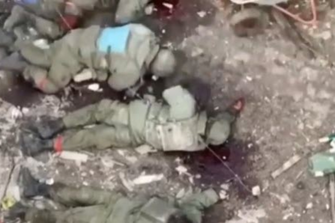 UKRAINE TROOPS MASSACRE SURRENDERING, DIS-ARMED, RUSSIANS LAYING FACE-DOWN ON GROUND