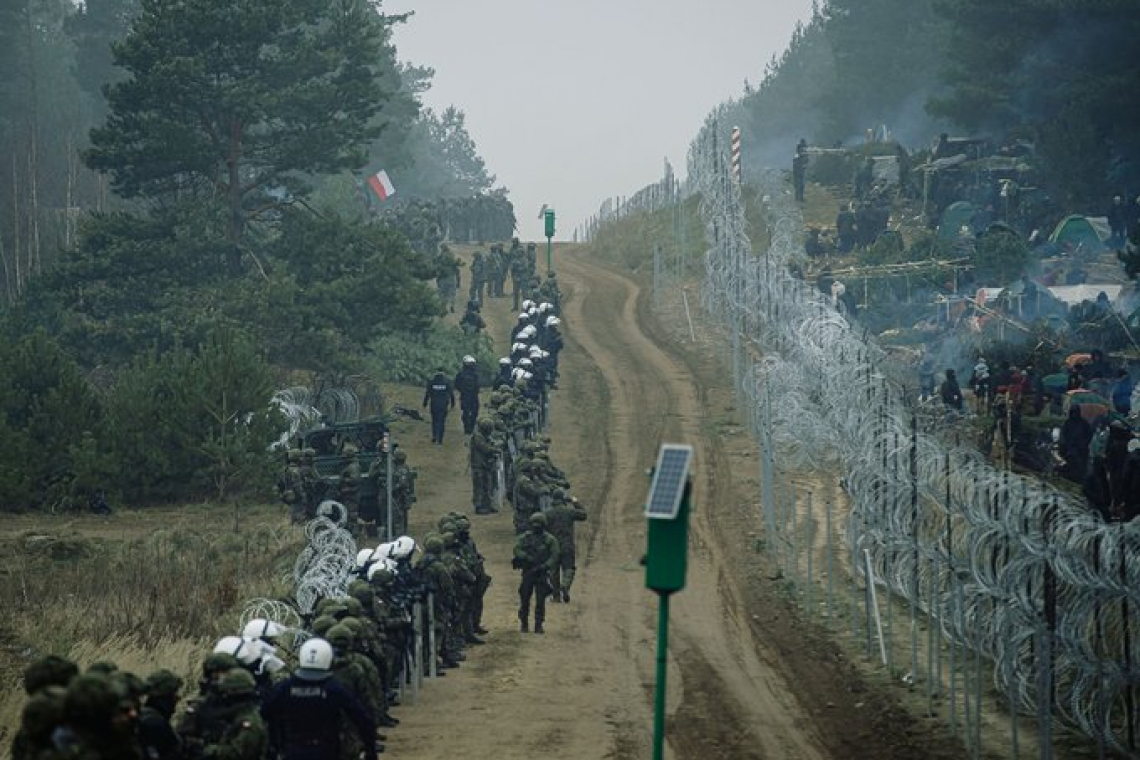 FLASH: POLAND SAYS BORDER TROOPS &quot;FIRED UPON FROM BELARUS&quot;