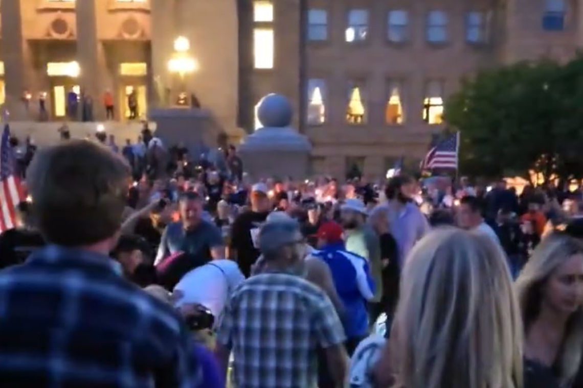 Liberal Rides Through Charlie Kirk Vigil on Scooter - Yelling &quot;F*ck Charlie Kirk; Gets Beat-down